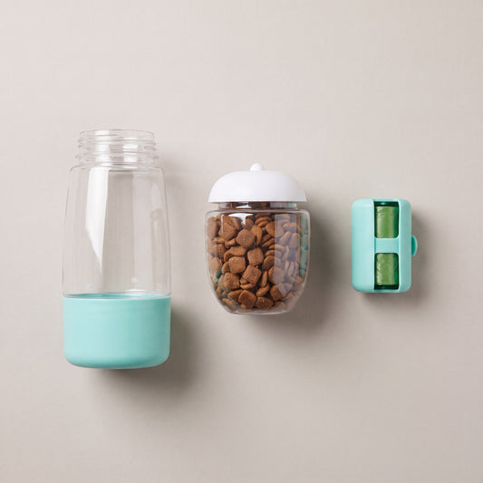 OHEN Trail Companion 3-in-1 dog water bottle in teal, standing upright with water tank and food chamber filled