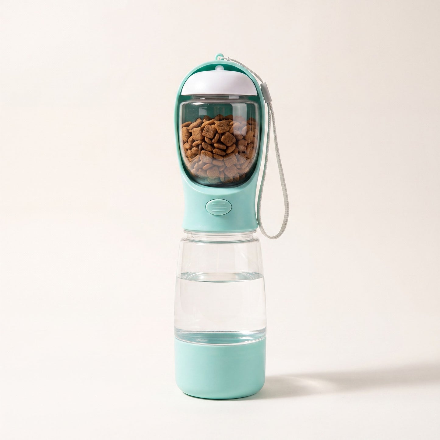 Trail Companion dog water bottle shown with carry strap, 20.3 oz water tank and 3.5 oz food container